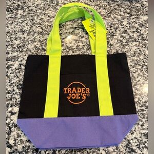 Trader Joe's Black and Purple Tote Bag with Green Handles